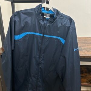 Nike Golf Men's Dark Jacket with Blue Accent